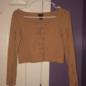 Long sleeve lace up sweater